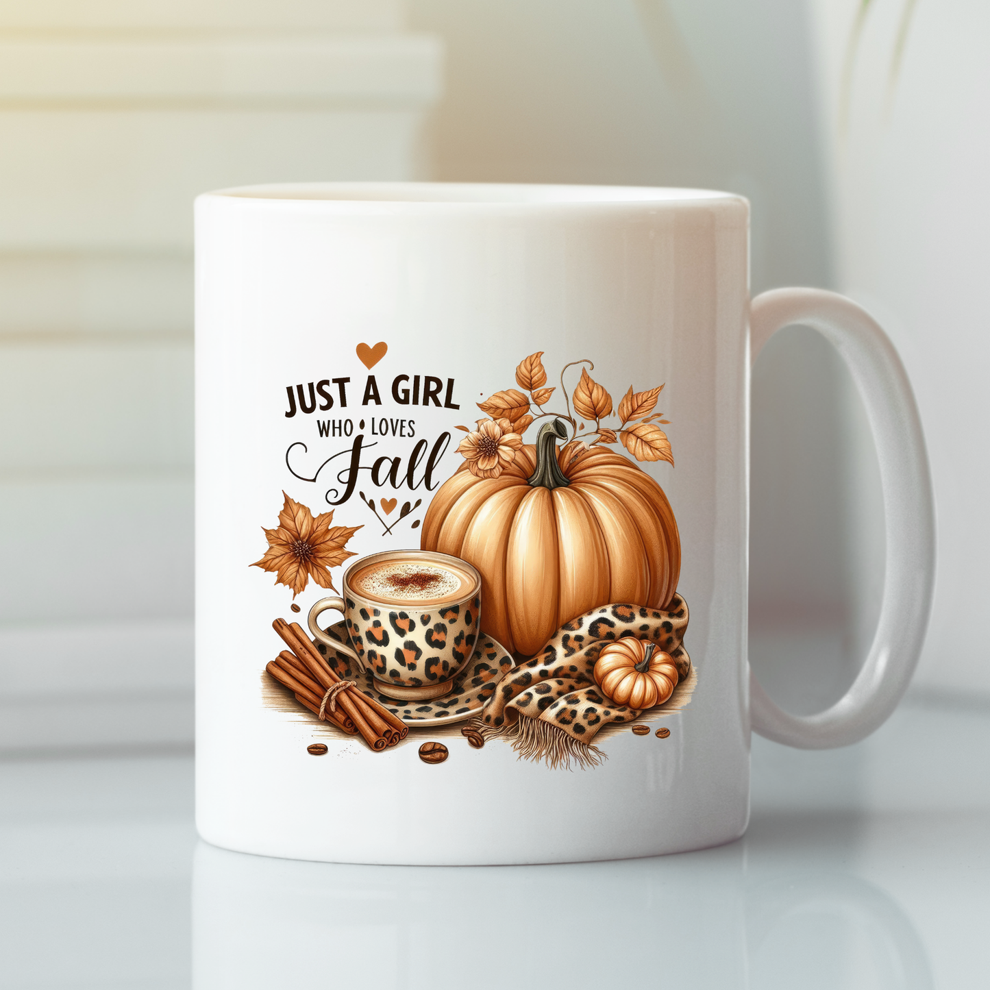 The Just a Girl Who Loves Fall Mug features pumpkins, cinnamon sticks, a leopard print scarf, autumn leaves, and a coffee cup with heart-shaped foam—perfect for pumpkin spice lovers and anyone who adores autumn!.