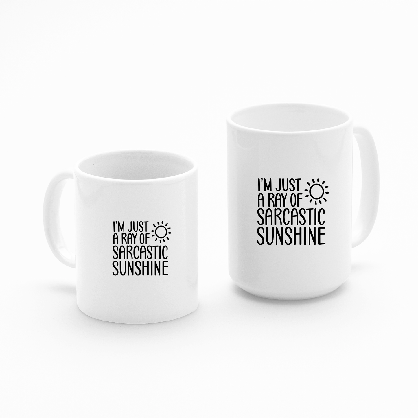 Two Sarcastic Sunshine Mugs—funny coffee gifts featuring "I’m just a ray of sarcastic sunshine" and a sun graphic—sit side by side on a white background, perfect for snarky coworkers who enjoy humor.