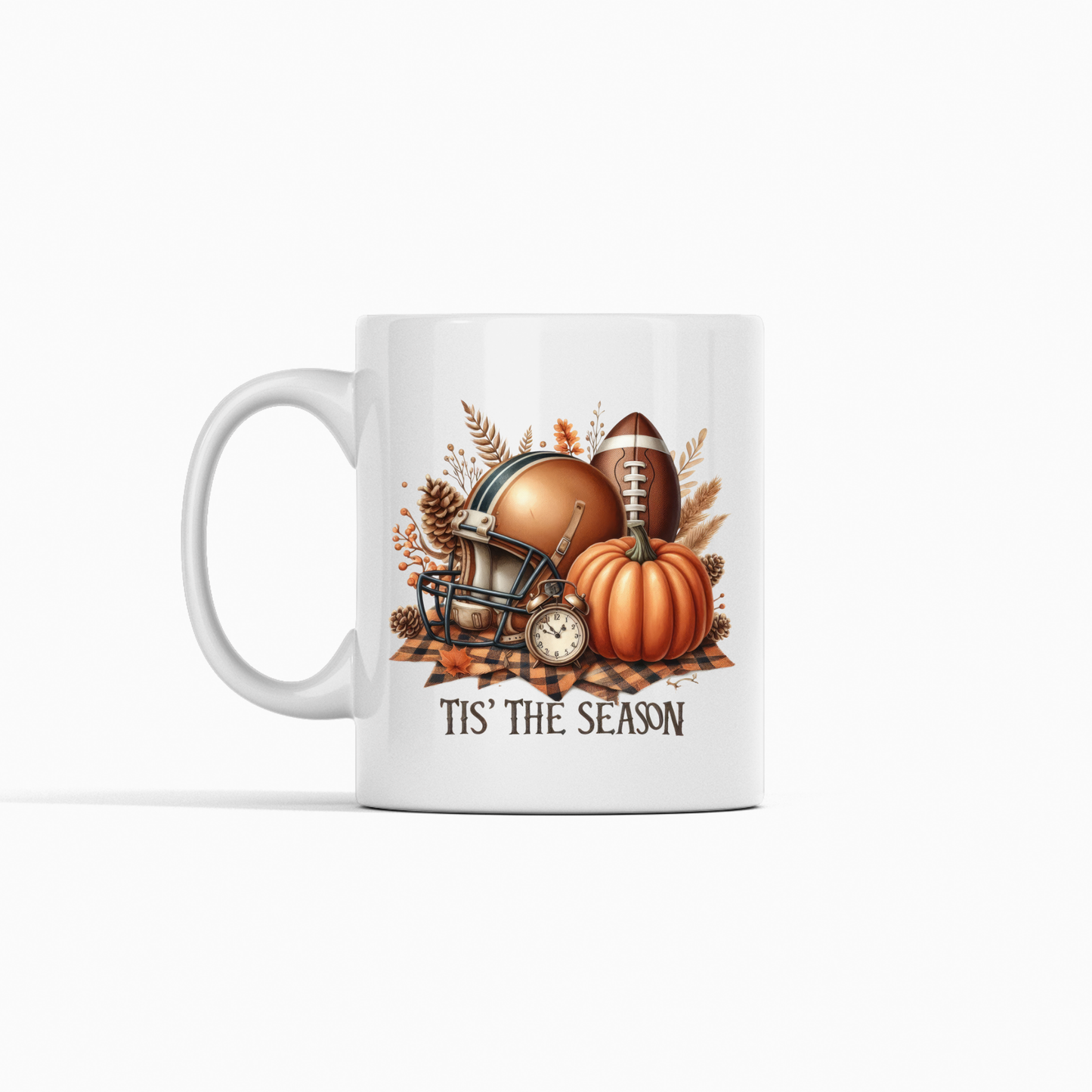 Sip in style with the Tis' the Season Football Mug, featuring football, helmet, pumpkins, autumn leaves, and a small clock—perfect for cozy fall game days!.
