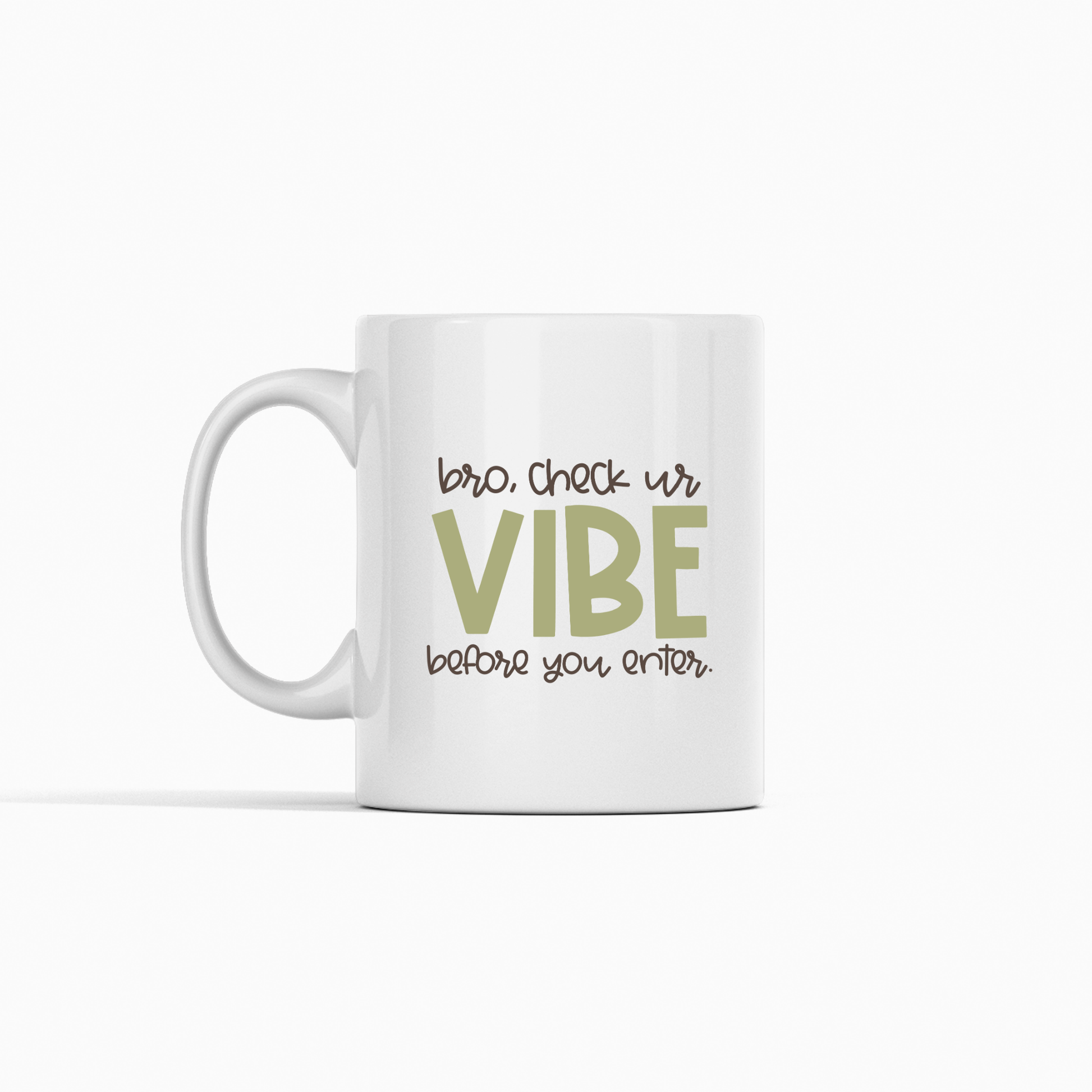 The Check Your Vibe Teacher Mug features playful, bold text with "bro, check ur VIBE before you enter."—"VIBE" stands out in olive green on a plain white ceramic mug. A perfect funny classroom gift for teachers to add some humor.