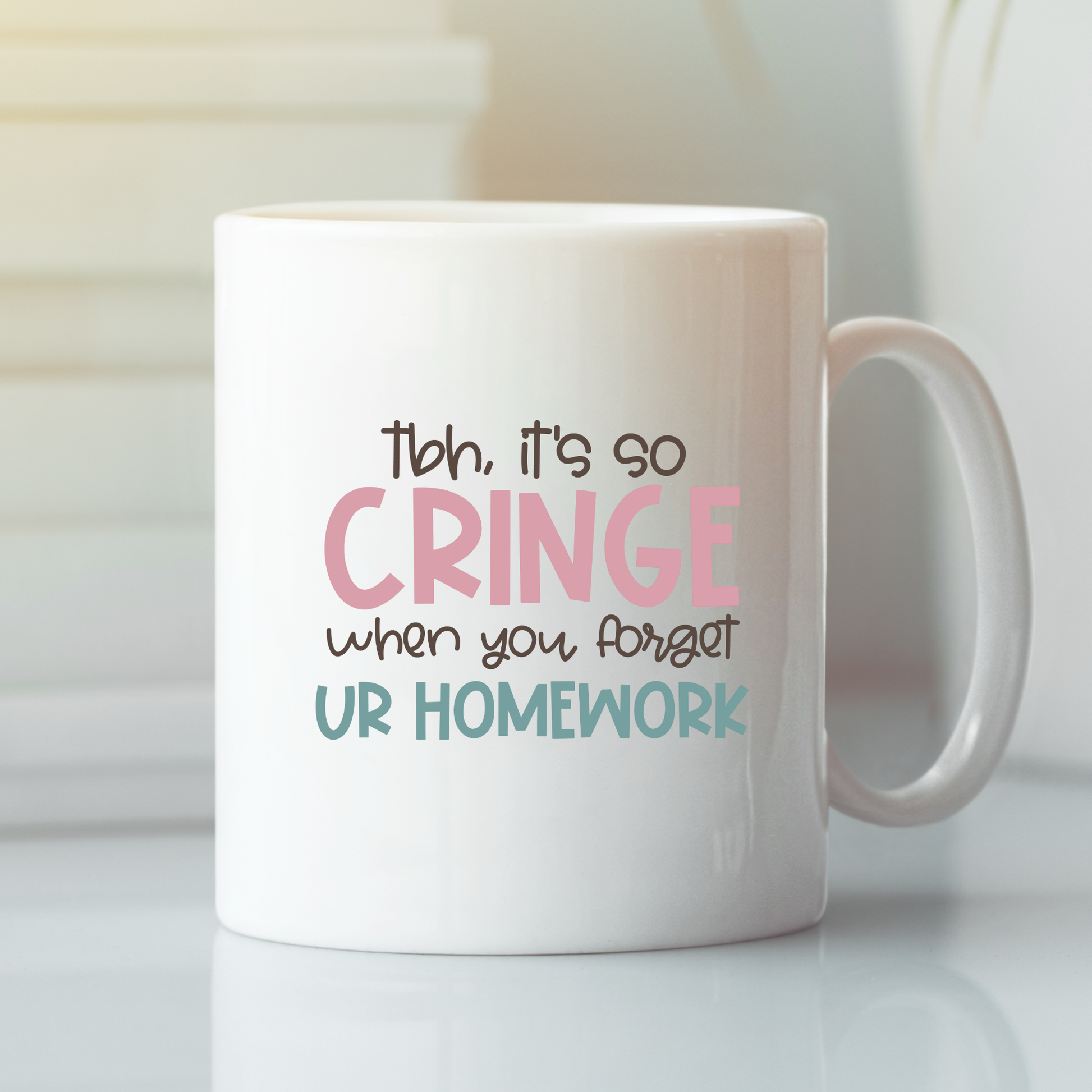 The Forgot Homework Teacher Mug | Funny Classroom Gift features “Tbh, it’s so CRINGE when you forget UR HOMEWORK” in pastel fonts—a perfect teacher appreciation present and a playful classroom accessory.