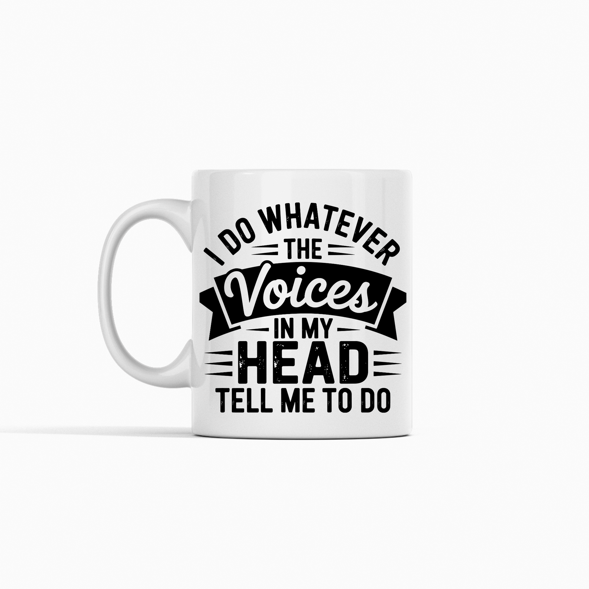 The "Voices in My Head Mug | Sarcastic Coffee Gift" is a white mug featuring bold black text that says, "I do whatever the voices in my head tell me to do," shown against a plain white background.