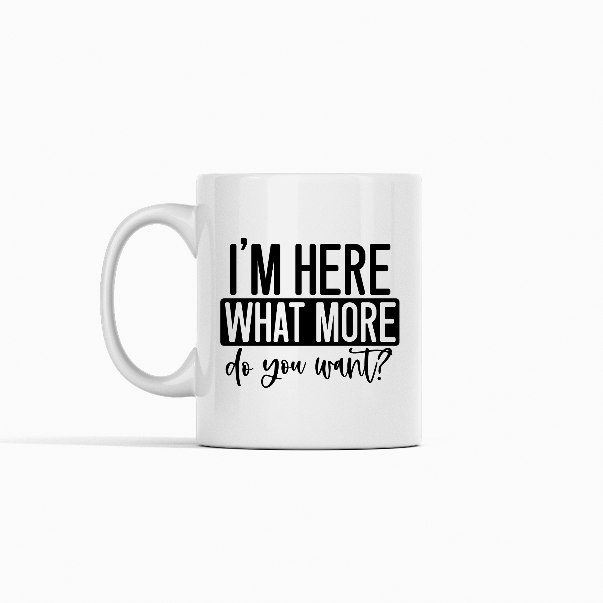 The I’m Here What More Do You Want Mug | Funny Sarcastic Coffee Cup is a white ceramic mug with bold black text, making it a perfect introvert gift. Its simple design and clear message stand out for anyone who loves sarcasm.