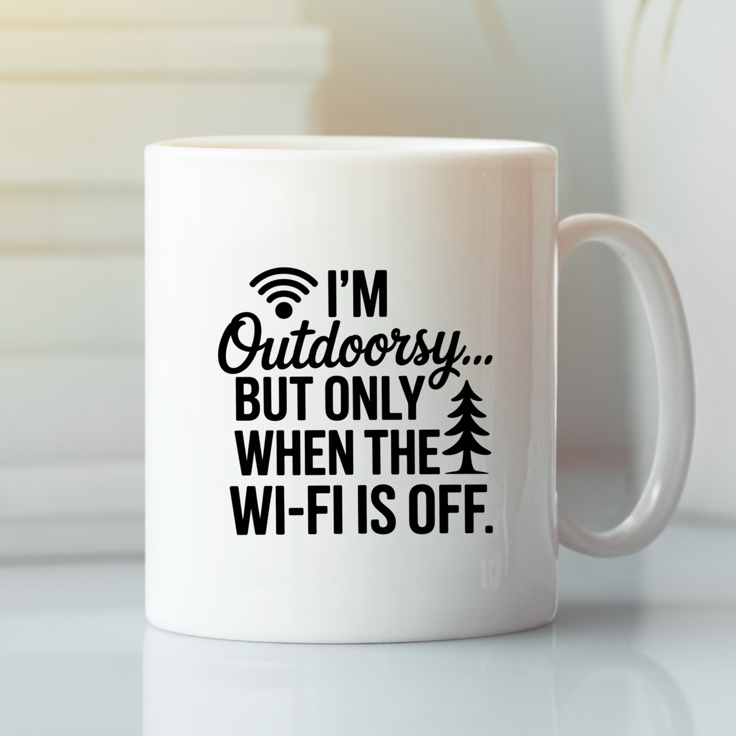 Introducing the “I'm Outdoorsy... But Only When the Wi-Fi Is Off Mug”—a white mug featuring a witty phrase along with a Wi-Fi icon and a cute tree illustration. This humorous coffee mug is an ideal gift for anyone who loves camping, whether they're connected or unplugged!.