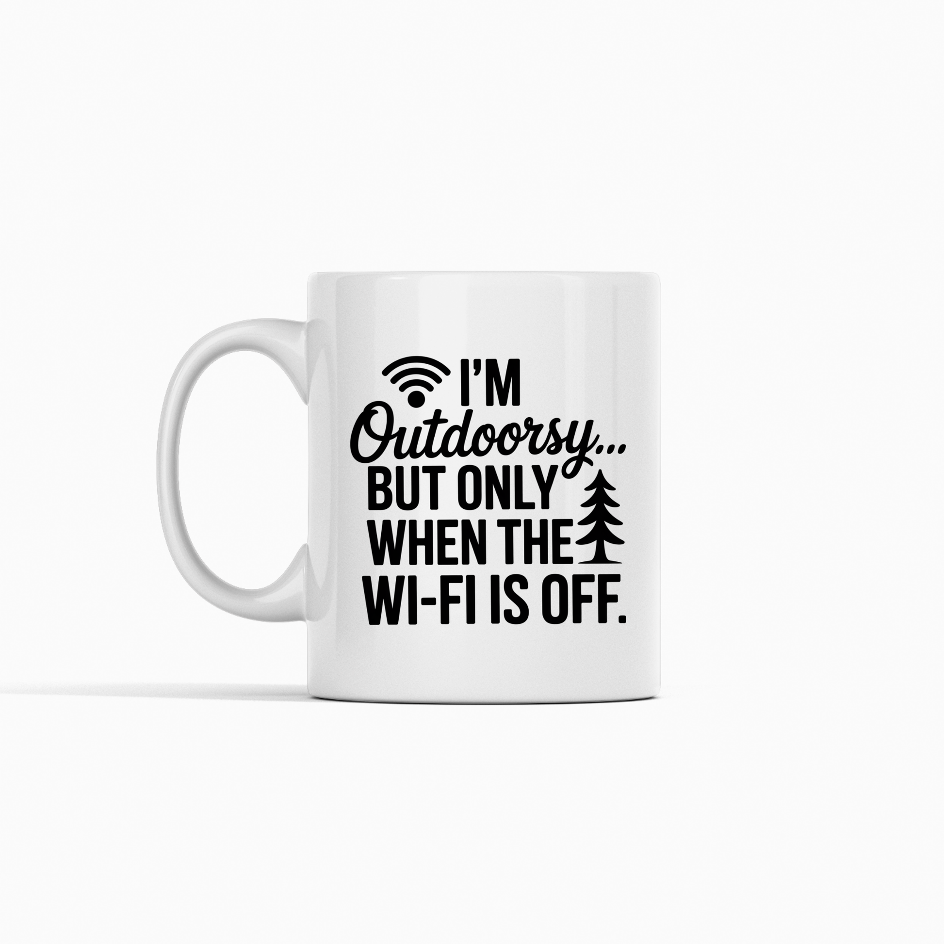 Introducing the "I'm Outdoorsy... But Only When the Wi-Fi Is Off Mug"—a white camping mug featuring bold black text, a playful Wi-Fi symbol, and a small tree graphic. This humorous coffee mug is an ideal gift for nature lovers who appreciate a good laugh.