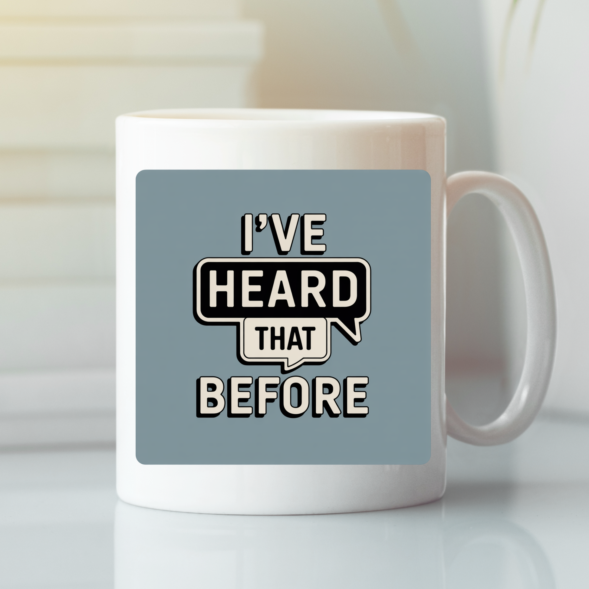Sure! Here’s a rewritten sentence using your provided product data: The "I've Heard That Before Mug | Office Humor Coffee Cup" is a white ceramic mug decorated with a bold blue square design, speech bubble graphics, and the phrase "I’ve heard that before"—making it the perfect funny office mug for anyone who enjoys sarcastic humor with their morning coffee.