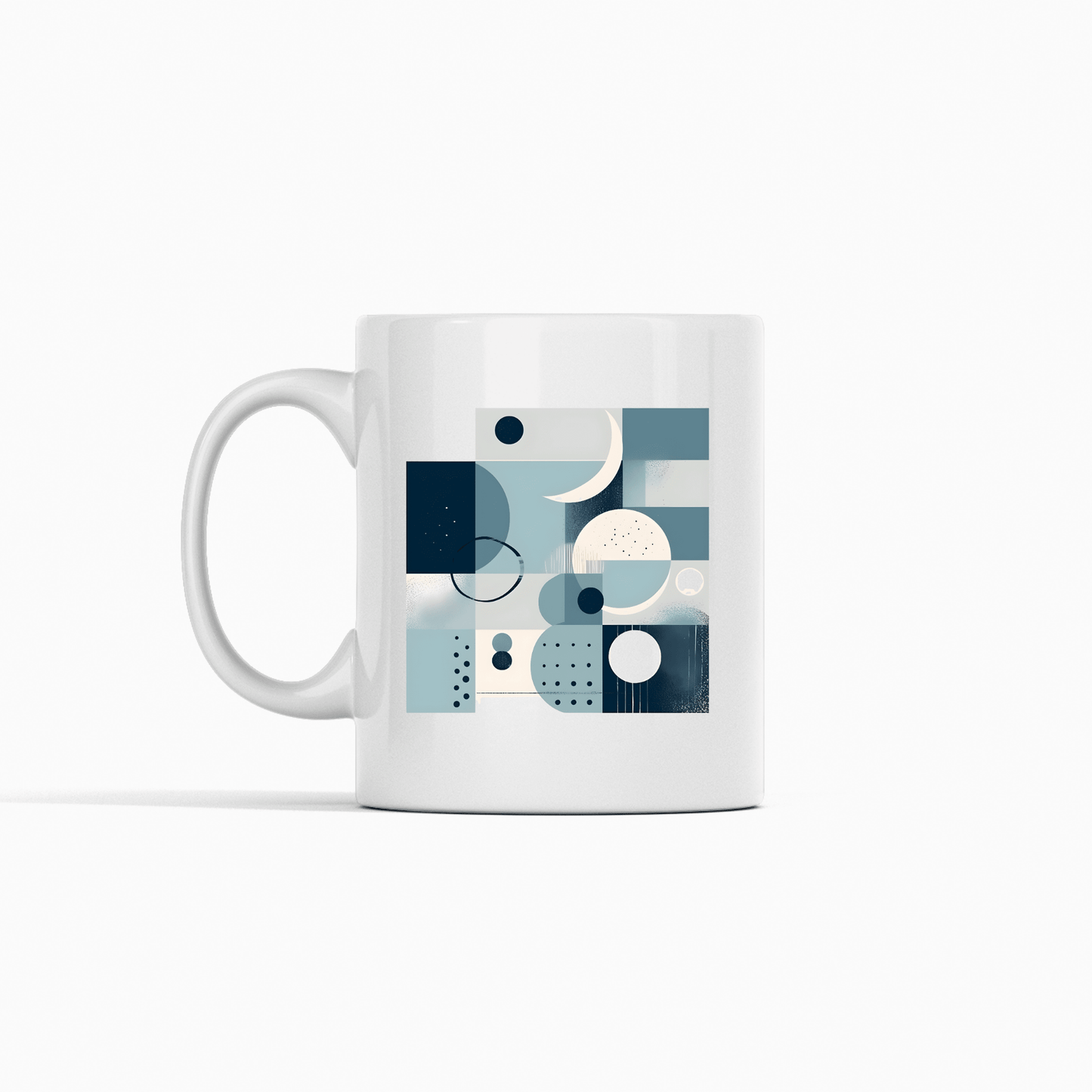 The Moonlit Geometry Mid Century Modern Mug is a white ceramic cup decorated with an abstract blue and gray pattern of circles, squares, and lines in a bold geometric Mid Century Modern style.