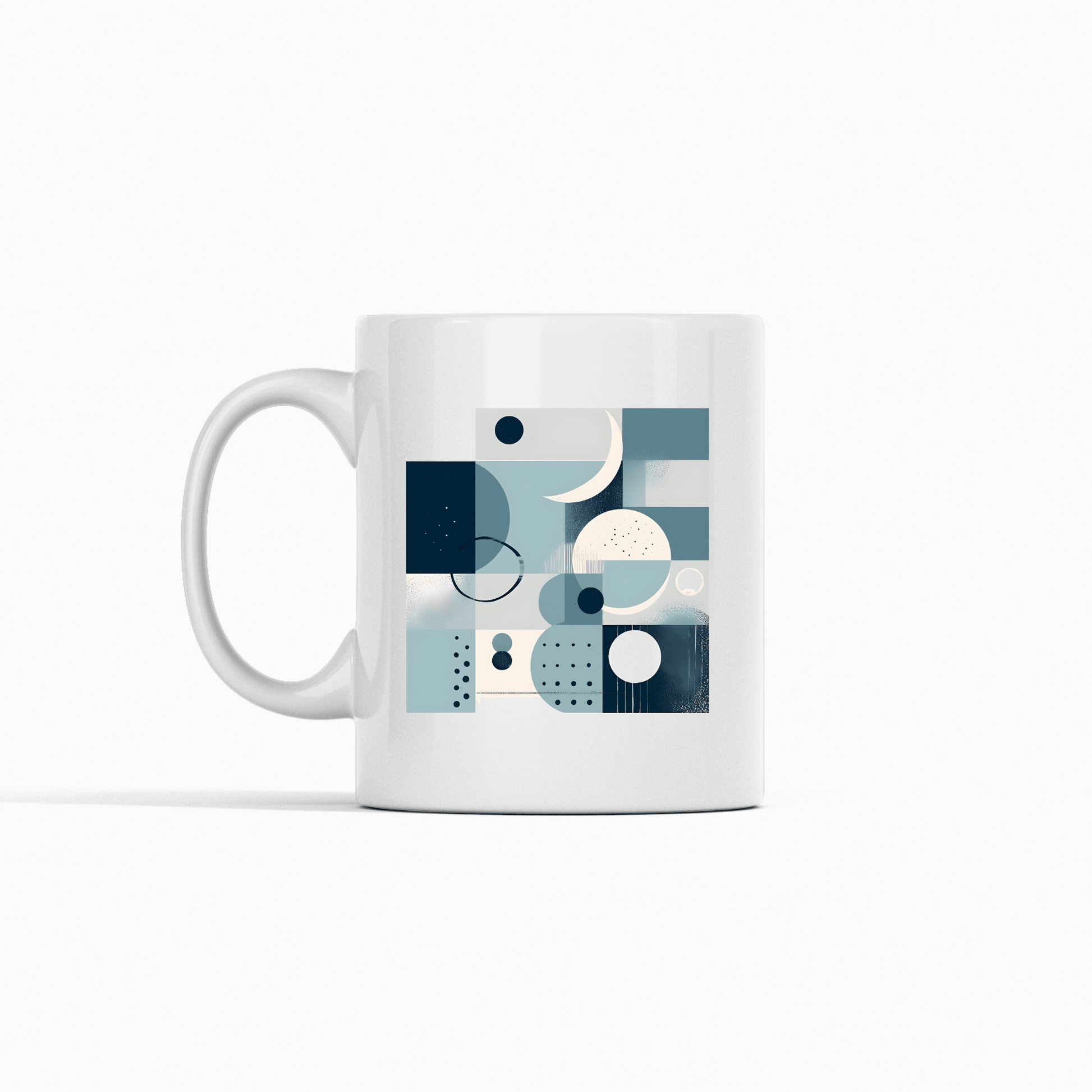 The Moonlit Geometry Mid Century Modern Mug is a white ceramic cup decorated with an abstract blue and gray pattern of circles, squares, and lines in a bold geometric Mid Century Modern style.