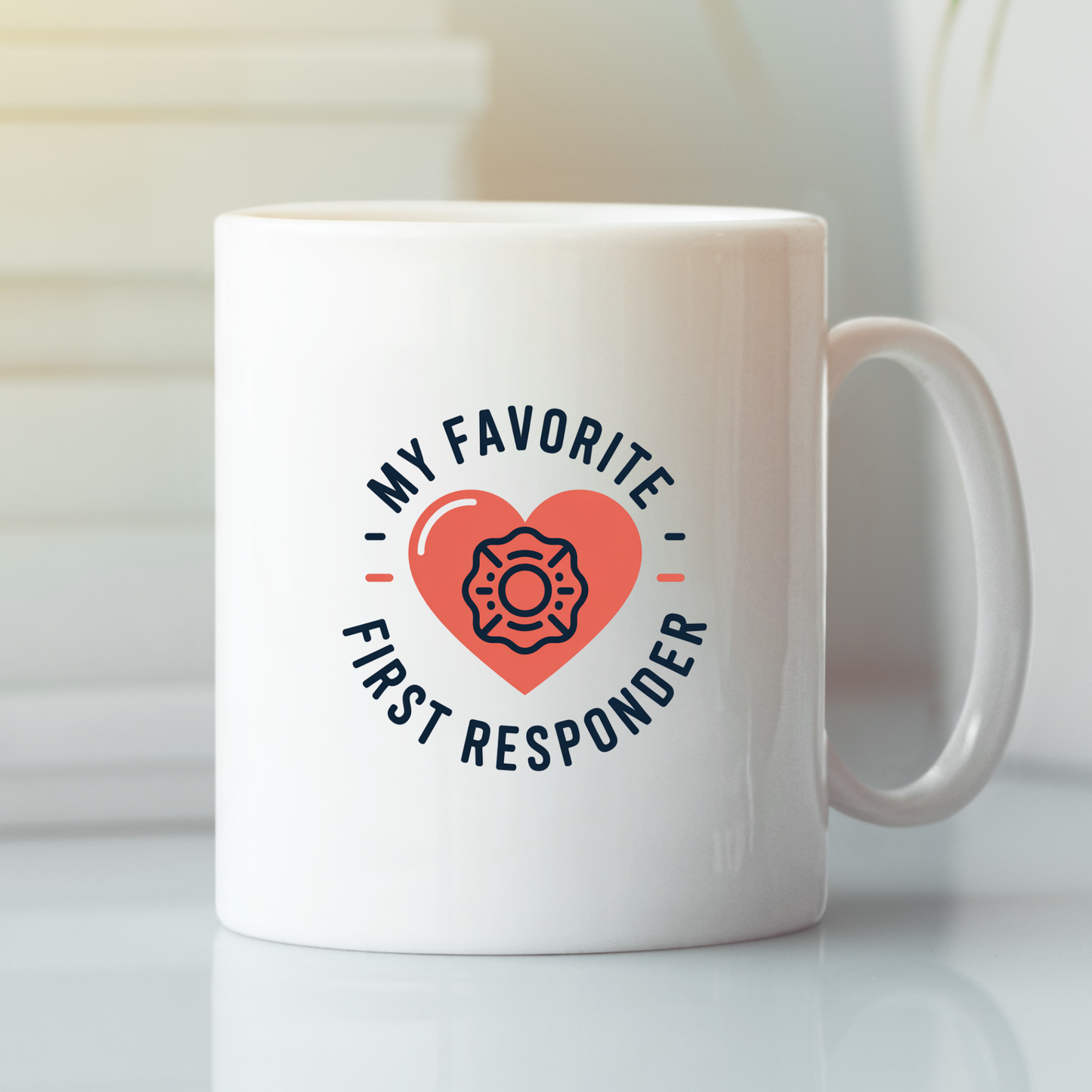 The My Favorite First Responder Mug | Appreciation Gift is a white mug adorned with a red heart and badge icon, featuring the phrase "My Favorite First Responder." This charming mug makes an ideal appreciation gift for any first responder or emergency professional you admire.
