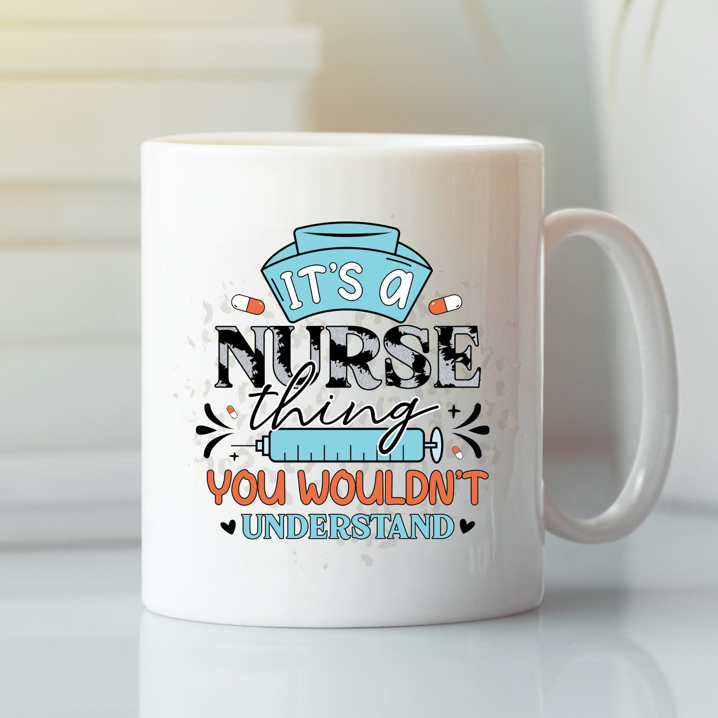 The Funny Nurse Mug Gift features "It's a nurse thing you wouldn't understand" in colorful fonts, with nurse cap and syringe graphics. Perfect nurse gift for any healthcare hero, this playful white mug sits on a clean white surface.