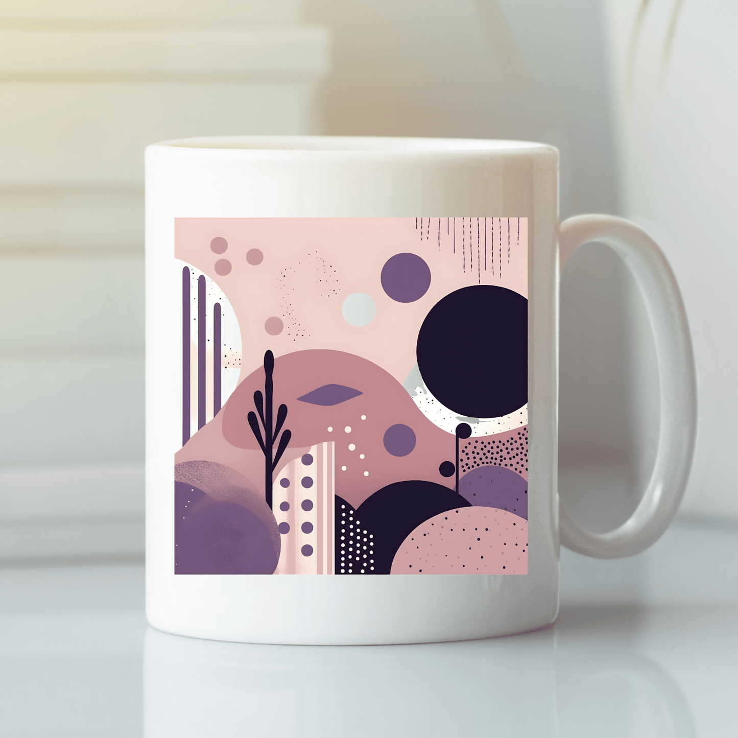 The Purple Dusk Mid Century Modern Mug features an abstract mid-century design in pink, purple, and black geometric patterns, shown on a white surface with a blurred background.