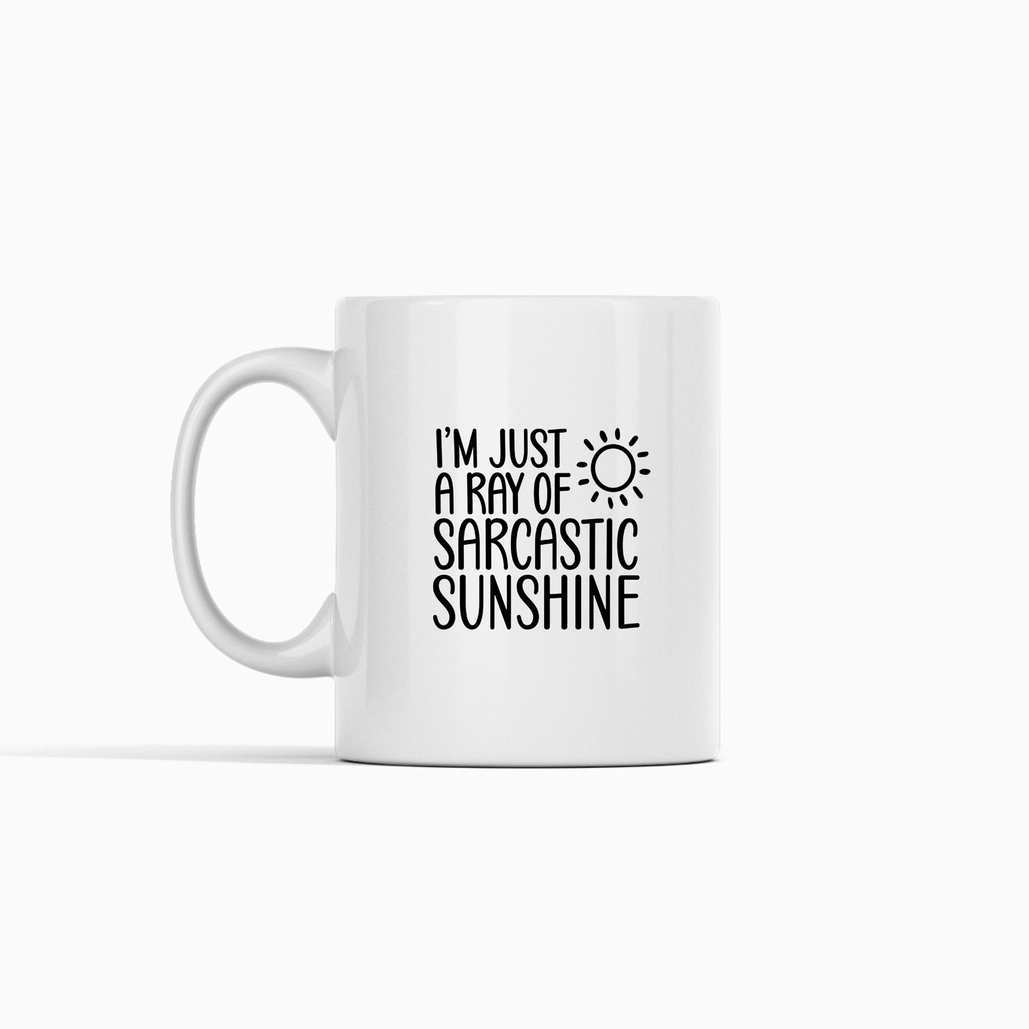 The Sarcastic Sunshine Mug | Funny Coffee Gift for Snarky People is a white ceramic mug with "I’m just a ray of sarcastic sunshine" and a sun doodle—perfect as a humorous gift for coworkers.