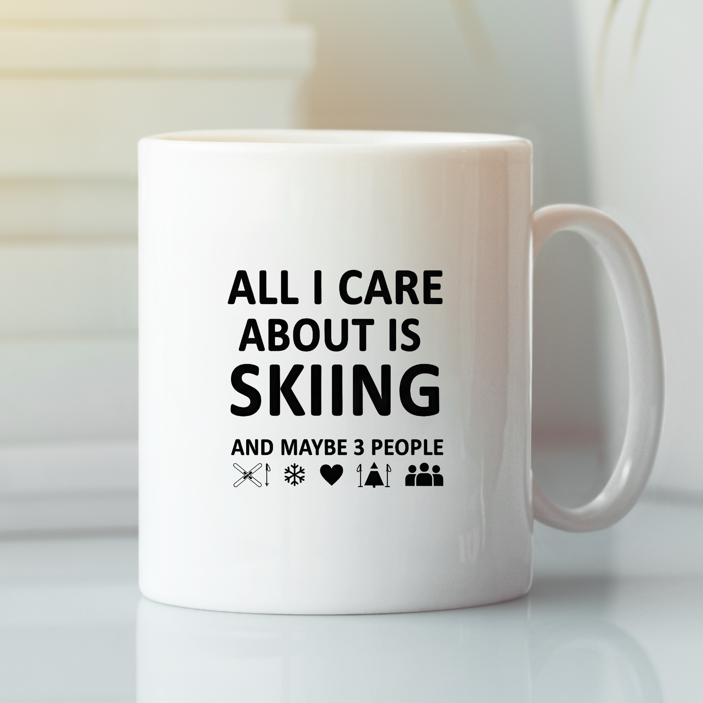 The Skiing and Three People Mug – Funny Coffee Cup features bold black text, "All I care about is skiing and maybe 3 people," plus ski pole, snowflake, heart, skier, and three-person icons—an ideal gift for introverted skiers.