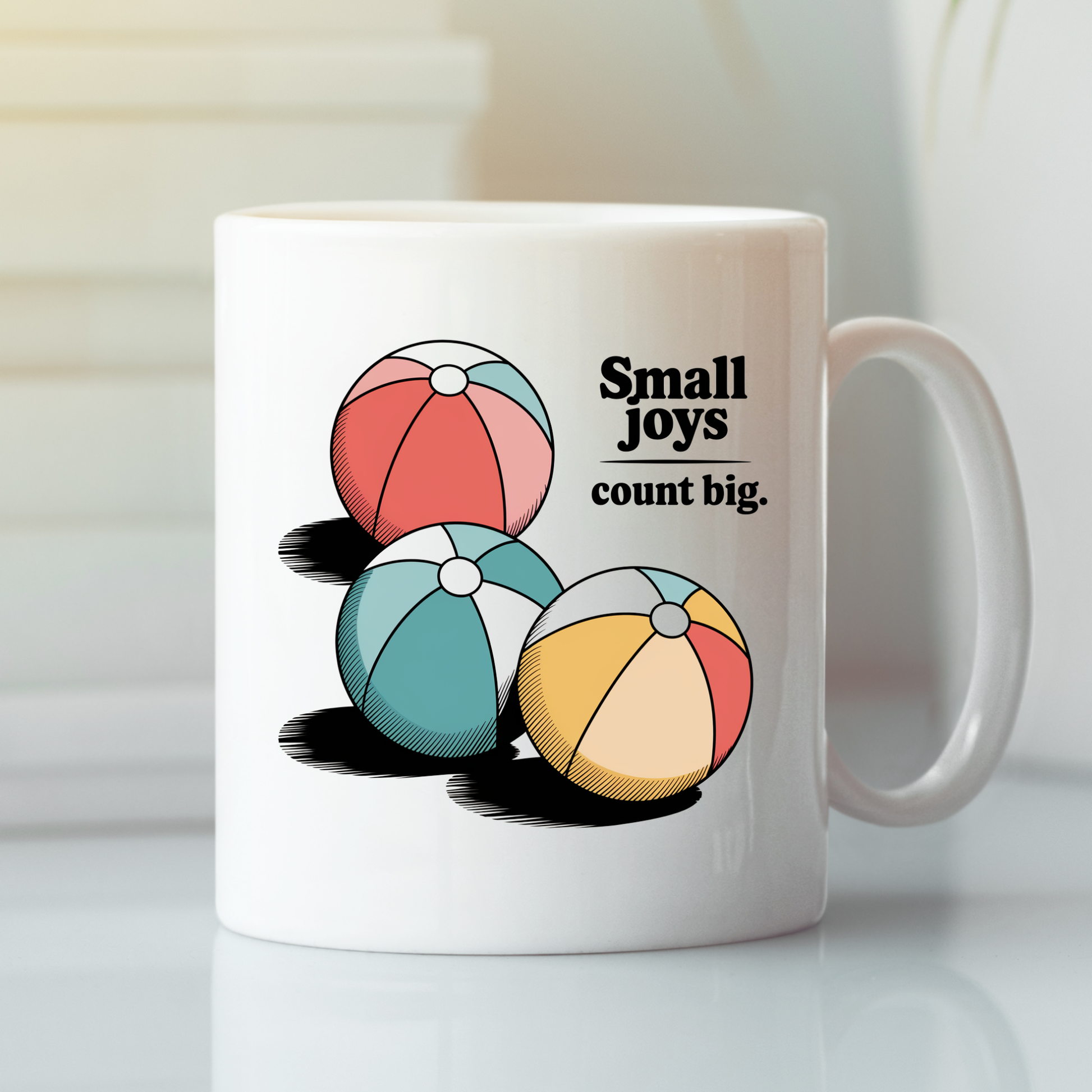 The Small Joys Count Big Mug | Inspirational Coffee Mug is a ceramic coffee mug featuring three colorful beach balls and the text “Small joys count big.” printed beside them. This mug serves as a perfect reminder to appreciate life's cheerful moments.