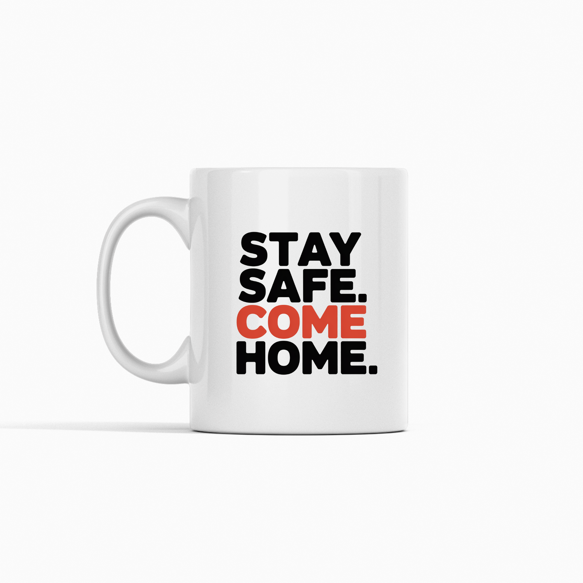 The Stay Safe Come Home Mug | Gift for First Responders features the phrase "STAY SAFE. COME HOME." printed on a white mug, with "COME" highlighted in orange and the other words in black, set against a plain white background—a meaningful gift for police officers or anyone serving as a first responder.