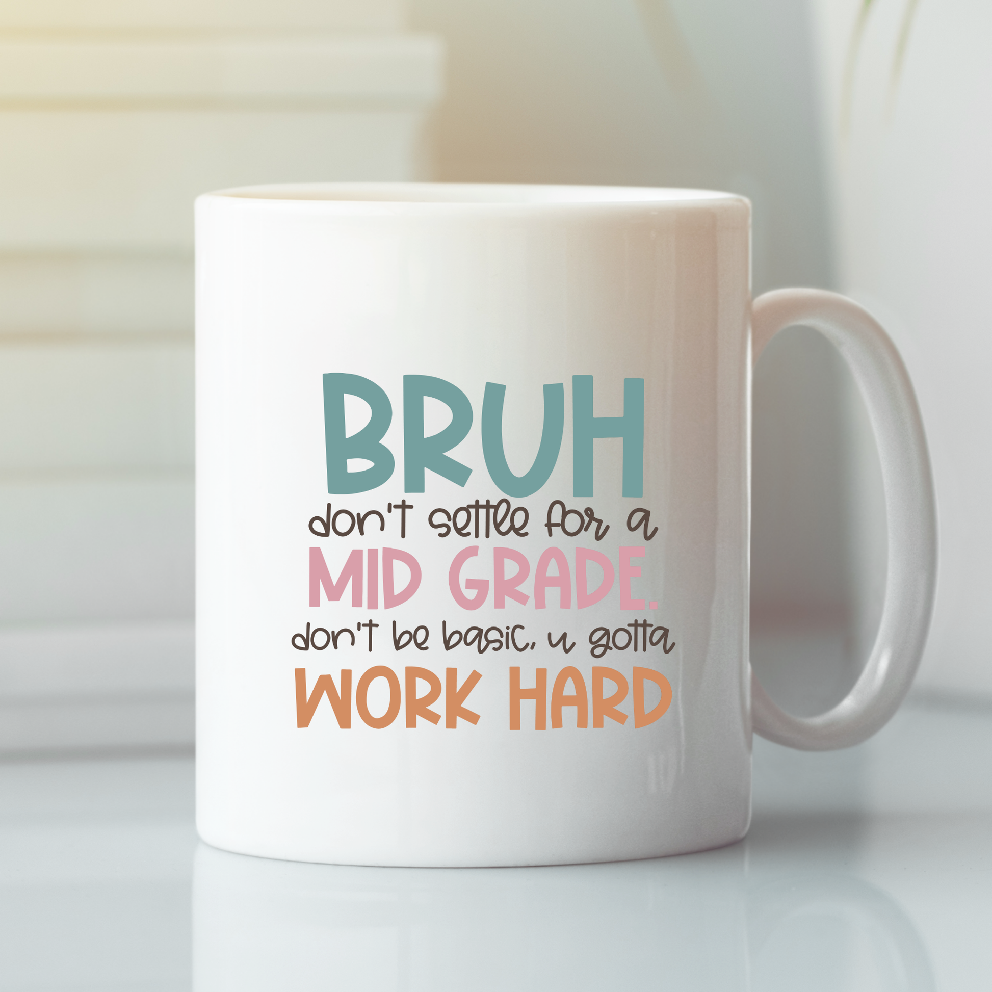 The Work Hard Teacher Mug | Growth Mindset Gift features "BRUH don't settle for a MID GRADE, don't be basic, u gotta WORK HARD" in teal, pink, brown, and orange—a perfect teacher gift or student motivator. Shown on a white surface with soft lighting.