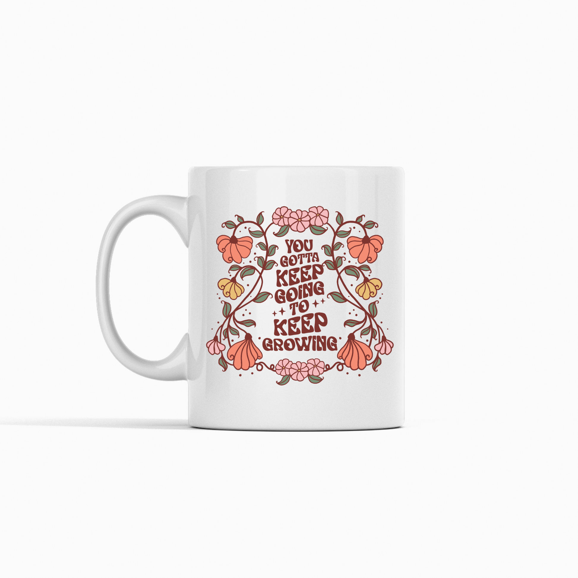 Brighten your daily routine with the Keep Going Keep Growing Mug | Inspirational Gift, featuring vibrant pink and orange floral accents around the uplifting message "You gotta keep going to keep growing" in decorative text on a simple background. This floral ceramic mug is the perfect way to stay inspired every day and makes an ideal Keep Going Keep Growing Mug for anyone who loves motivational gifts.